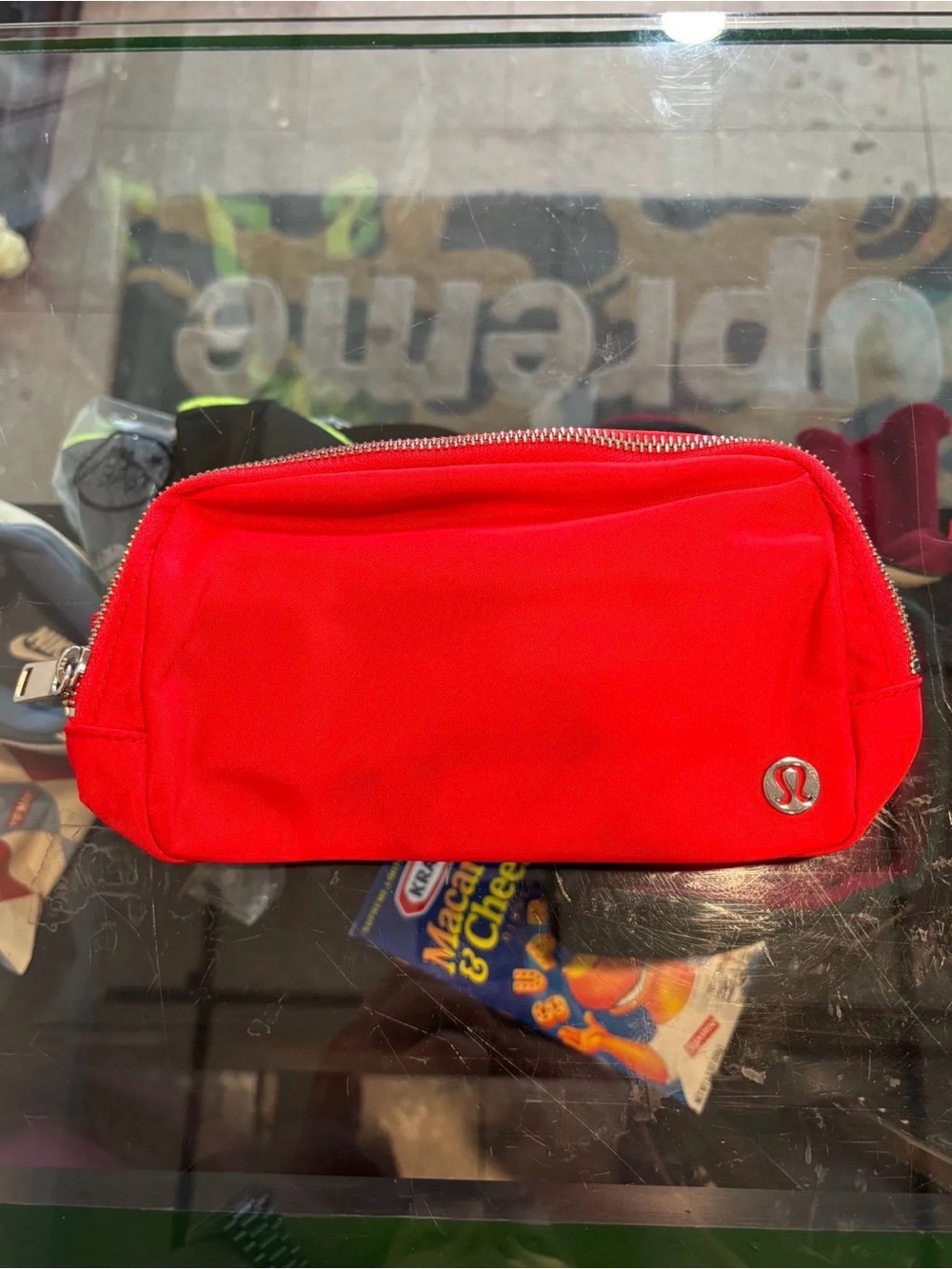 lululemon Everywhere Belt Bag 1L in a vibrant red color